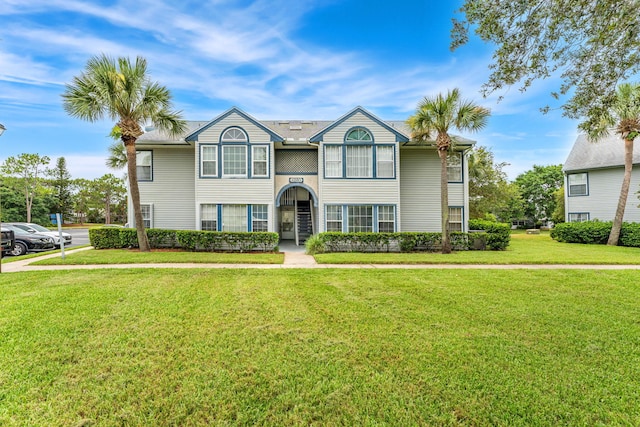 view of front of property with a front lawn