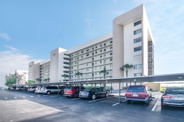 view of property with covered parking