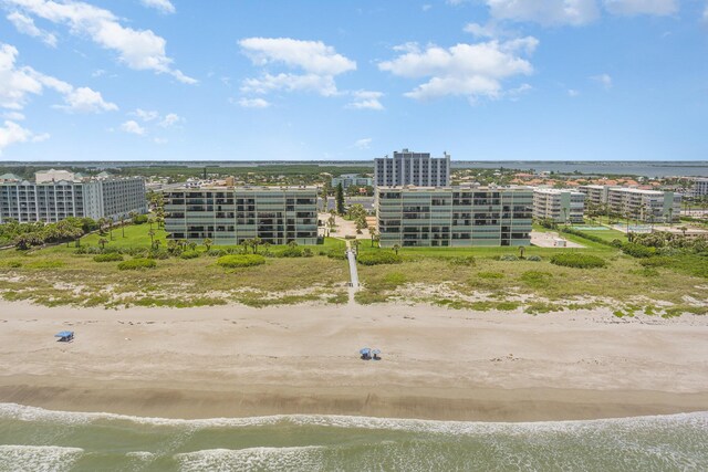 1860 N Atlantic Ave Unit 604, Cocoa Beach, FL 32931 - birds eye view of property with a view of the beach, a city view, and a water view
