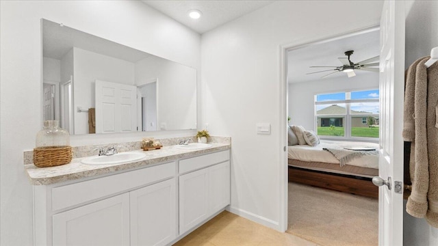 bathroom with vanity and ceiling fan