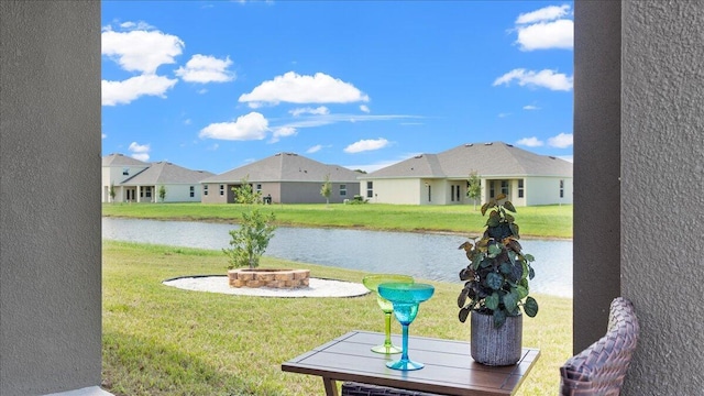 water view featuring a fire pit