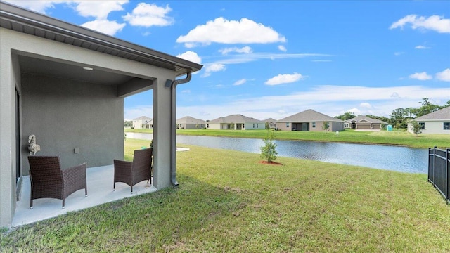 view of yard featuring a water view