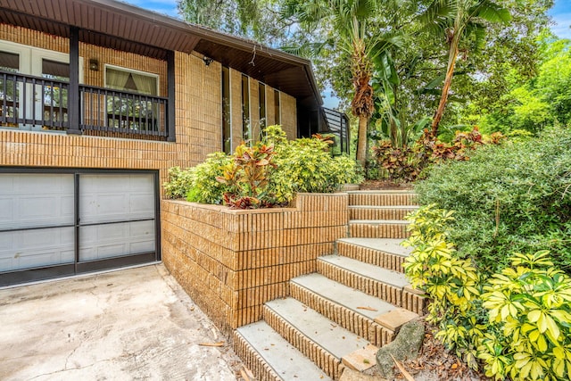 view of side of property with a garage