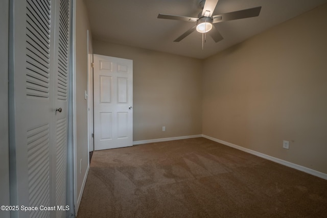 7667 N Wickham Rd Unit 1515, Melbourne, FL 32940 - unfurnished bedroom featuring carpet flooring, baseboards, a ceiling fan, and a closet