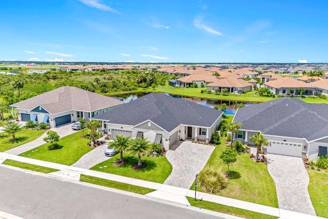 drone / aerial view featuring a water view