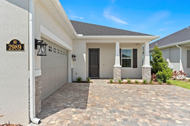 property entrance featuring a garage