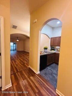 hall with dark hardwood / wood-style floors