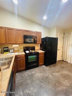 kitchen featuring sink and black appliances