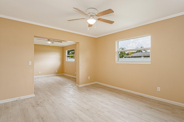 unfurnished room featuring crown molding, ceiling fan, and light hardwood / wood-style floors