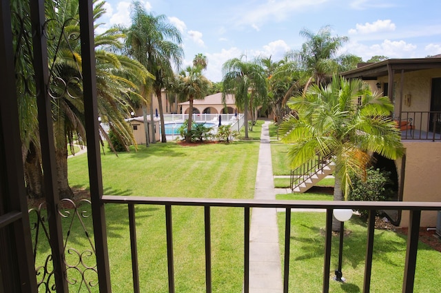 view of yard featuring a fenced in pool