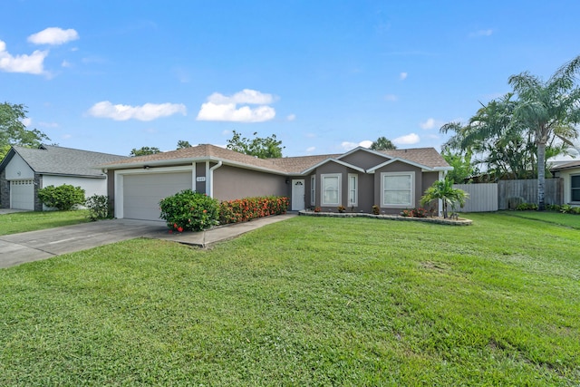 single story home featuring a garage and a front lawn