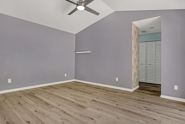 interior space with vaulted ceiling, ceiling fan, and light hardwood / wood-style floors