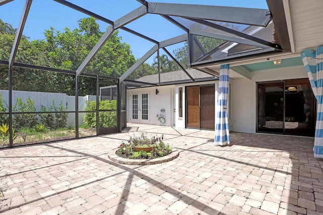 exterior space featuring a lanai and french doors