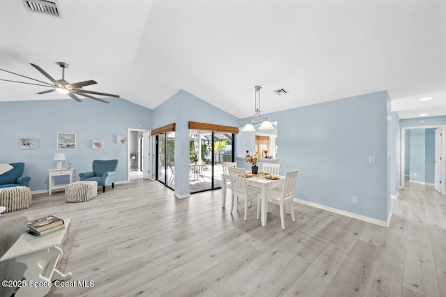 6209 S Mirror Lake Dr Unit 7, Sebastian, FL 32958 - dining room with light wood-type flooring, vaulted ceiling, a ceiling fan, and baseboards