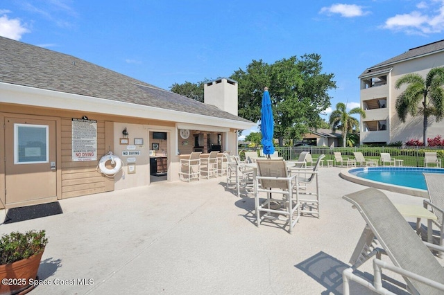 6209 S Mirror Lake Dr Unit 7, Sebastian, FL 32958 - community pool with a patio area