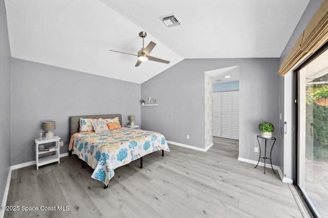 6209 S Mirror Lake Dr Unit 7, Sebastian, FL 32958 - bedroom featuring access to outside, lofted ceiling, wood finished floors, baseboards, and ceiling fan