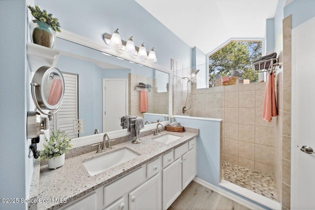 6209 S Mirror Lake Dr Unit 7, Sebastian, FL 32958 - full bath with walk in shower, double vanity, and wood finished floors