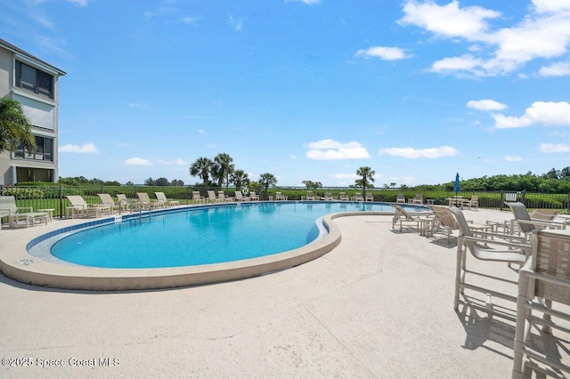 6209 S Mirror Lake Dr Unit 7, Sebastian, FL 32958 - community pool featuring a patio area