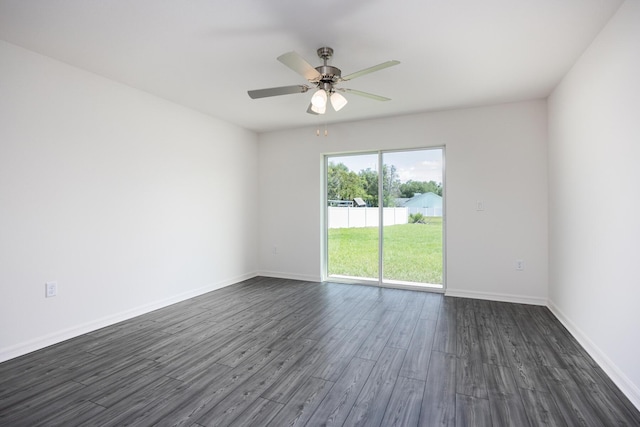 unfurnished room with dark wood-type flooring and ceiling fan