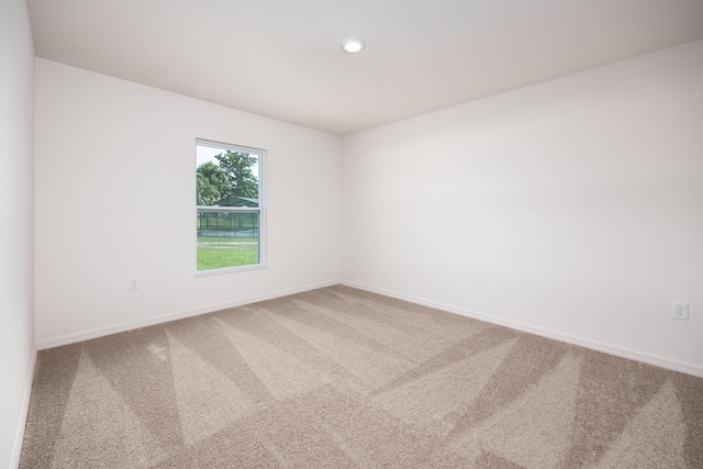 view of carpeted spare room