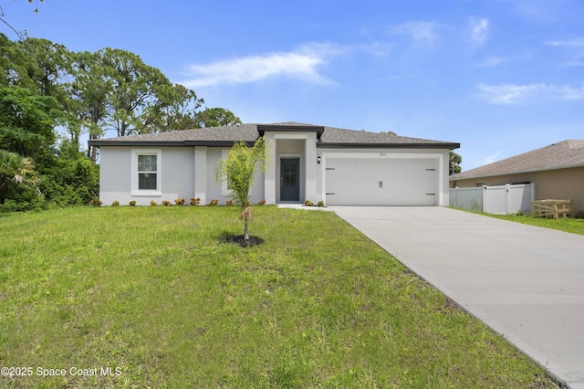 1035 Flintlock Ave SE, Palm Bay, FL 32909 - prairie-style home with stucco siding, an attached garage, concrete driveway, and roof with shingles