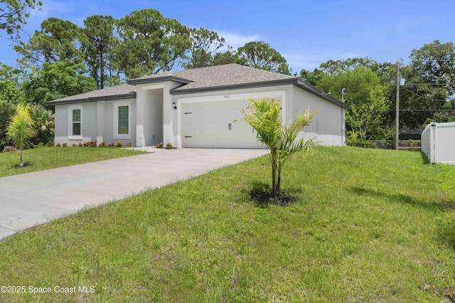 1035 Flintlock Ave SE, Palm Bay, FL 32909 - prairie-style house with an attached garage, driveway, a front lawn, and stucco siding