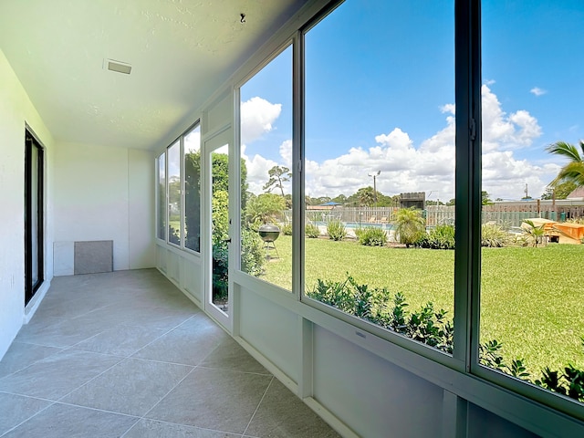 view of unfurnished sunroom