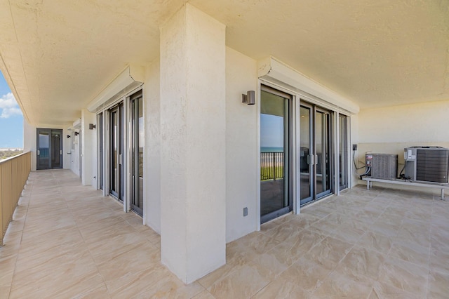 balcony featuring central air condition unit