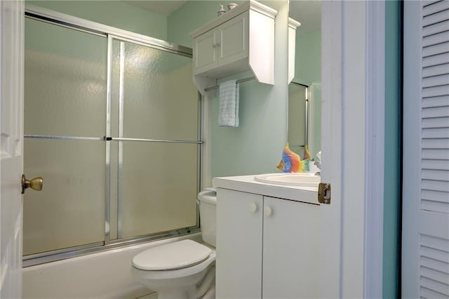 9635 Riverside Dr Unit 3, Sebastian, FL 32958 - full bathroom with vanity, toilet, and combined bath / shower with glass door