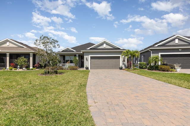 single story home with a front lawn and a garage