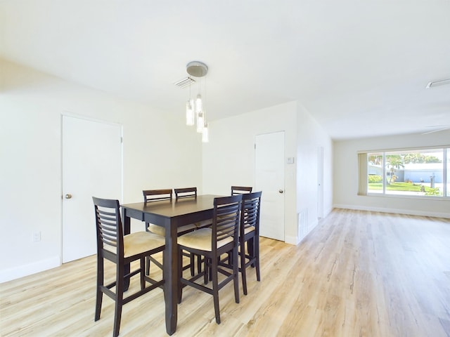 dining room featuring light hardwood / wood-style floors