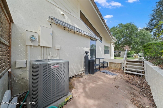 exterior space with central air condition unit