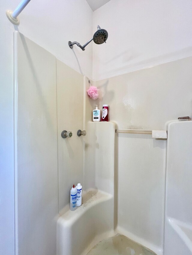 bathroom with shower / bathing tub combination