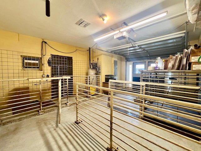 view of sauna featuring concrete floors