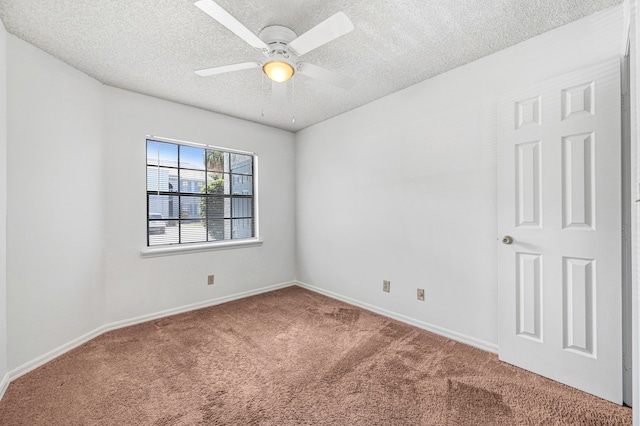 unfurnished room with carpet floors, a textured ceiling, and ceiling fan