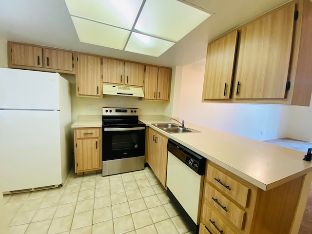 kitchen with white appliances, kitchen peninsula, light brown cabinetry, light tile patterned floors, and sink