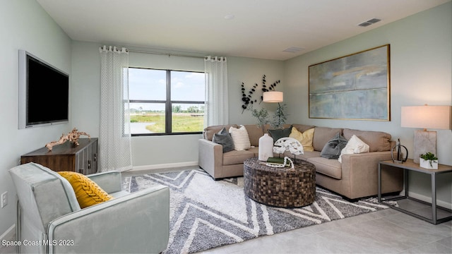 living room featuring light tile patterned floors