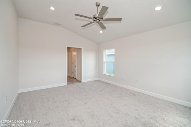 2283 Middlebury Dr SE, Palm Bay, FL 32909 - carpeted spare room with baseboards, ceiling fan, lofted ceiling, and recessed lighting