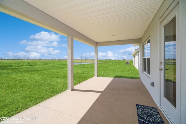 view of patio / terrace featuring a rural view