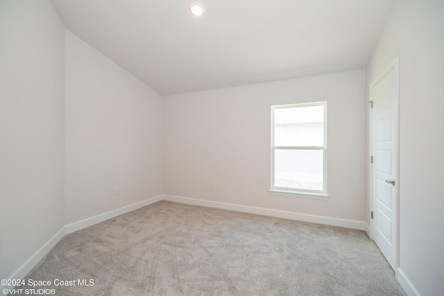 2283 Middlebury Dr SE, Palm Bay, FL 32909 - carpeted spare room featuring baseboards