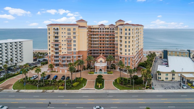 view of building exterior with a water view