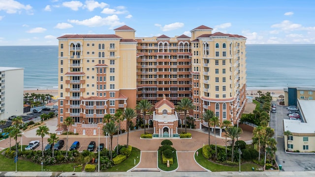 view of building exterior featuring a water view