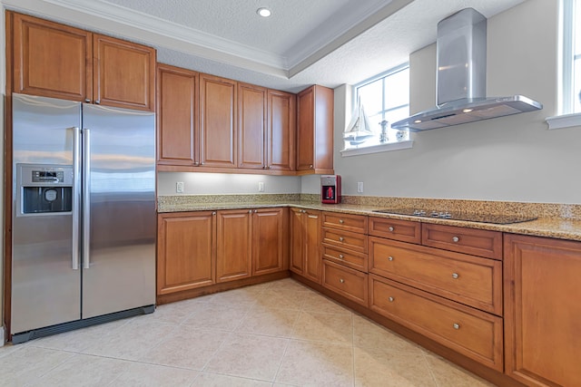 kitchen with wall chimney exhaust hood, crown molding, stainless steel fridge with ice dispenser, a textured ceiling, and light stone countertops