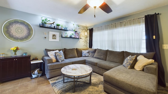 tiled living room featuring ceiling fan