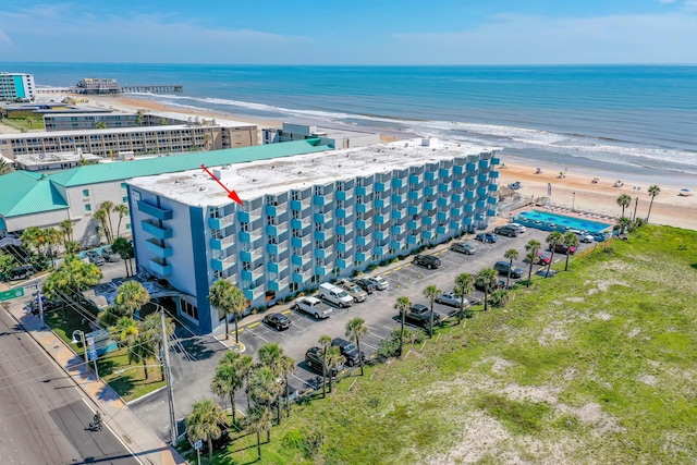 bird's eye view with a view of the beach and a water view