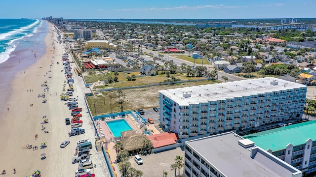 aerial view featuring a water view and a view of the beach