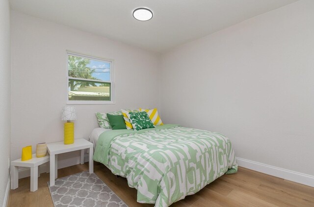 bedroom featuring hardwood / wood-style floors