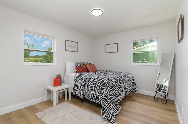 bedroom featuring light hardwood / wood-style floors