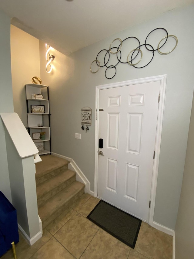 view of tiled foyer entrance