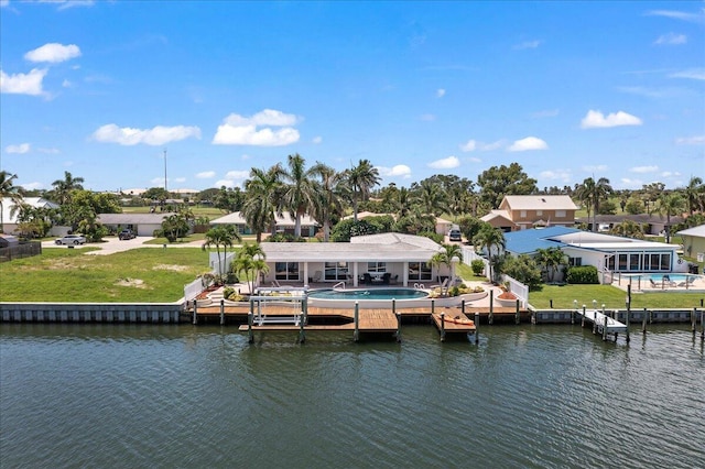 exterior space featuring a water view and a lawn